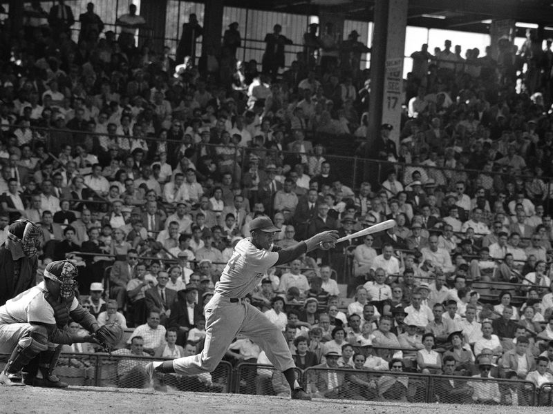 Ernie Banks hitting in 1955