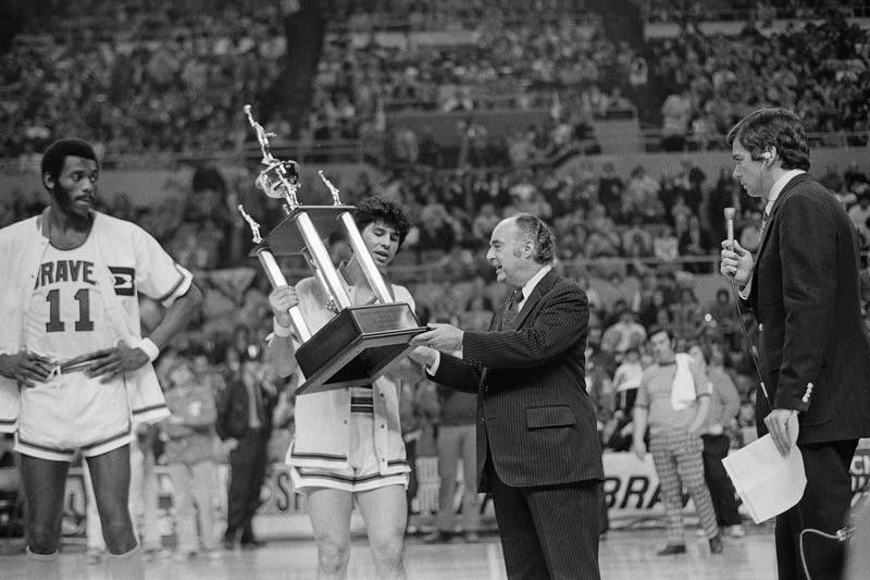 Ernie DiGregorio of the Buffalo Braves accepts the NBA's Rookie of the year trophy