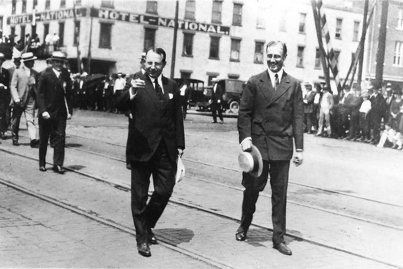 Franklin D. Roosevelt and James Cox walk together in Dayton, Ohio