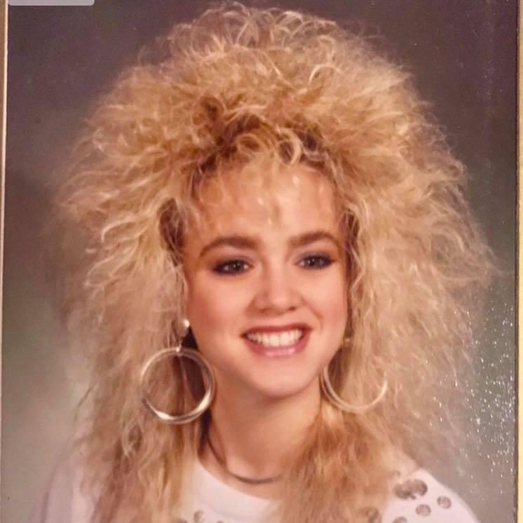Girl with puffy hair from the '80s