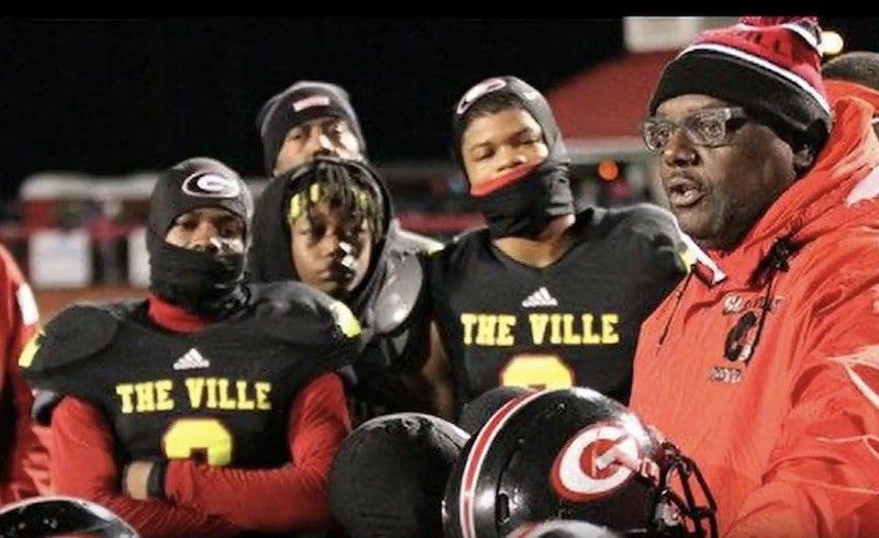 Glenville coach Ted Ginn Sr. and players