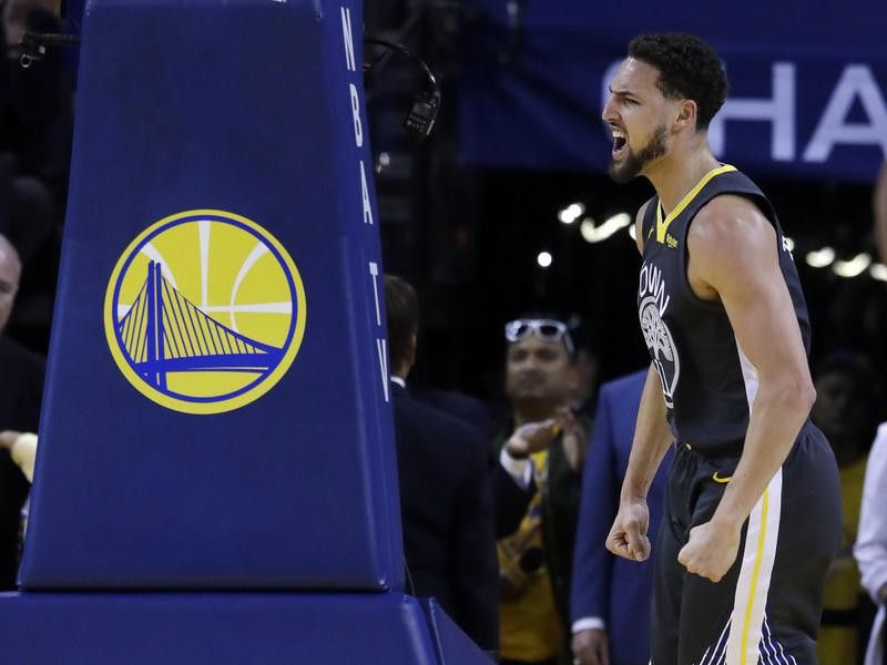 Golden State Warriors' Klay Thompson reacts
