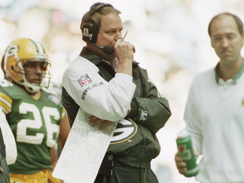 Green Bay Packers coach Mike Holmgren watches his team