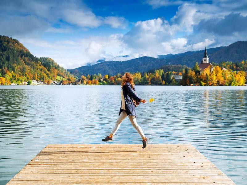 Happy woman on Lake Bled