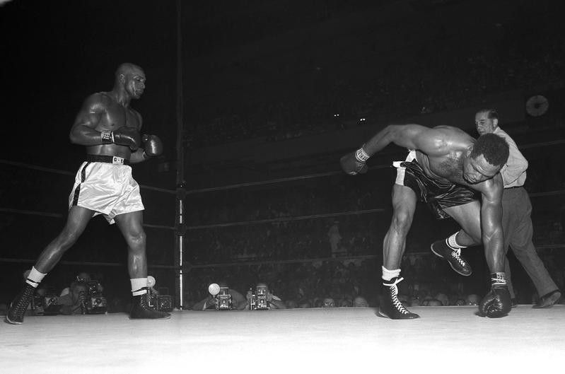 Harold Johnson in action against Archie Moore