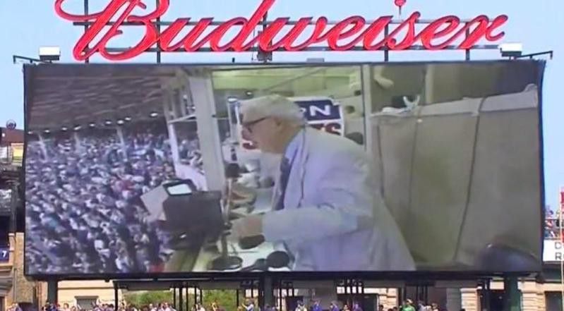 Harry Caray sings the seventh-inning stretch