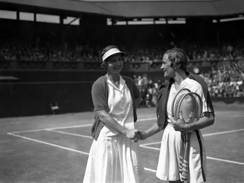 Helen Wills, left, being congratulated by Helen Jacobs after winning the 1935 women's singles championship at Wimbledon.