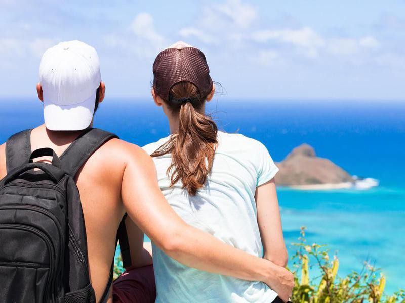 Hikers wearing baseball caps in Hawaii