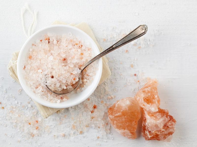 Himalayan Pink Rock Salt in bowl on table, hangover headache cure
