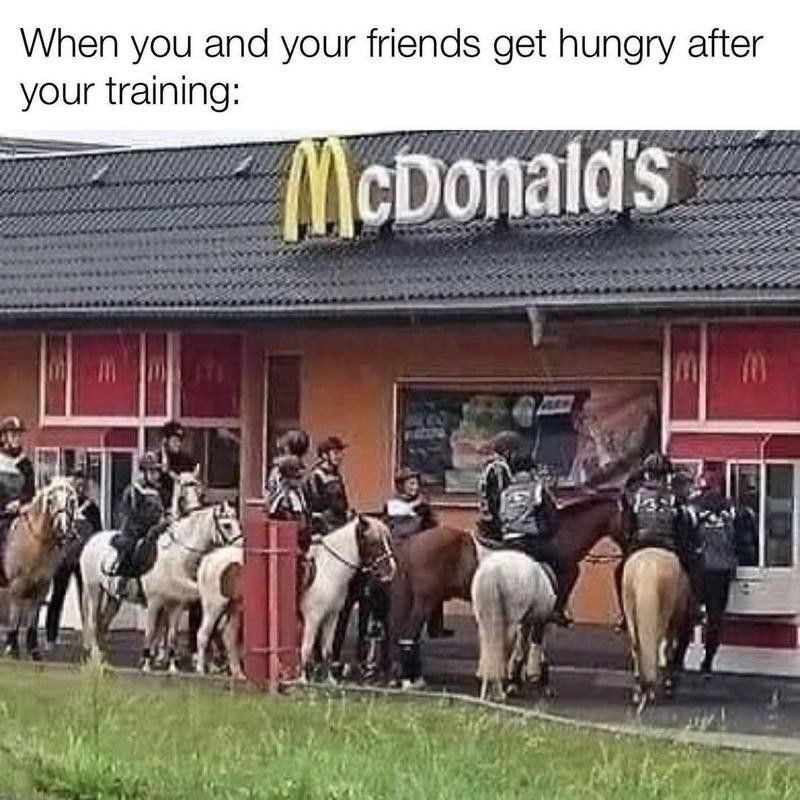 Horseback riders at a McDonald's