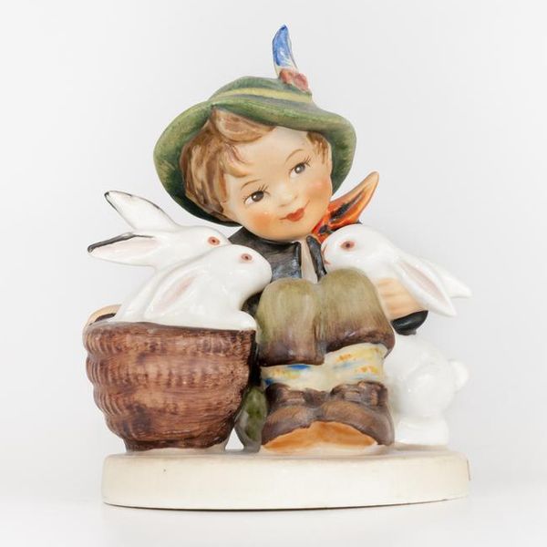 Phoenix, United States- July 25, 2011: This porcelain collectible figurine is entitled, "Playmates."  The series of figures were manufactured in the 1930's based on the drawings of Sister Maria Innocentia Hummel.