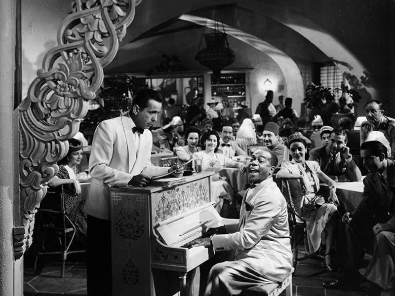 Humphrey Bogart and Dooley Wilson performing in Casablanca
