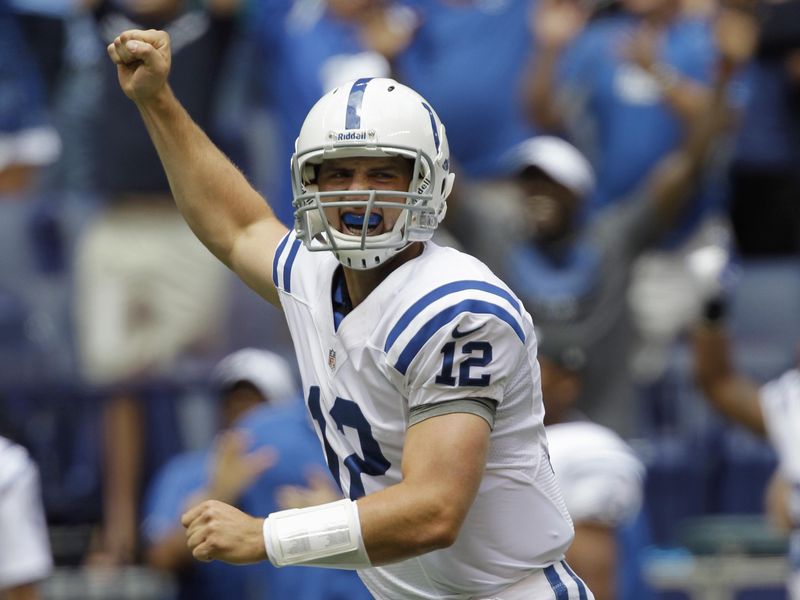 Indianapolis Colts quarterback Andrew Luck celebrates after throwing touchdown pass against St. Louis Rams