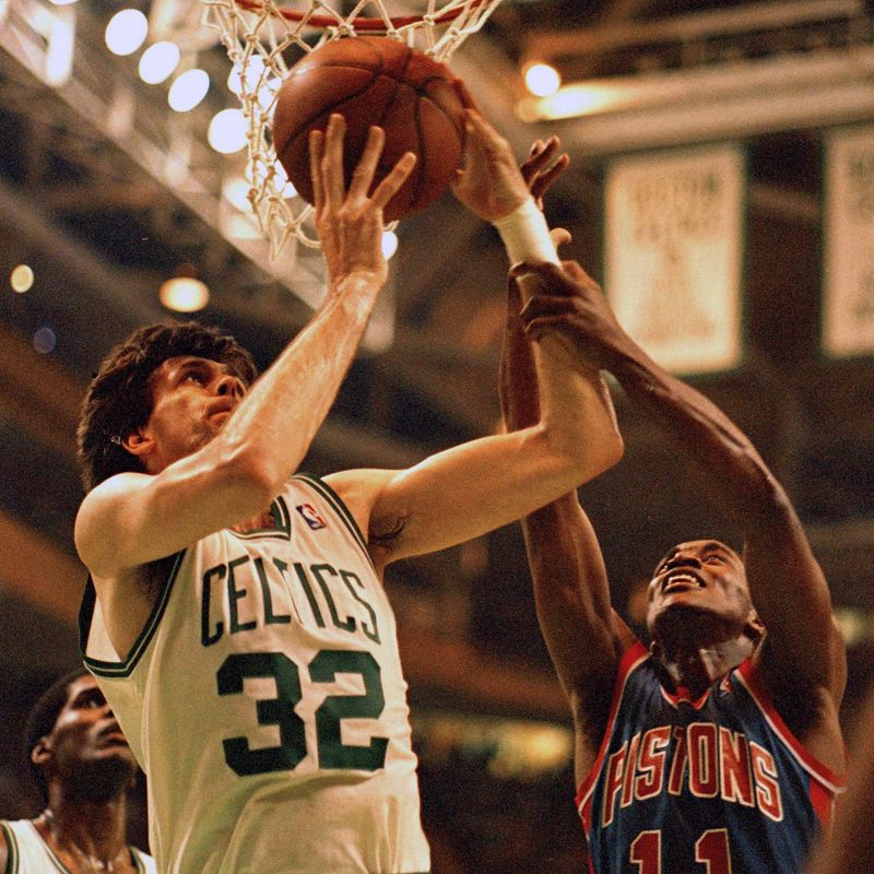 Isiah Thomas fights for rebound against Boston Celtics