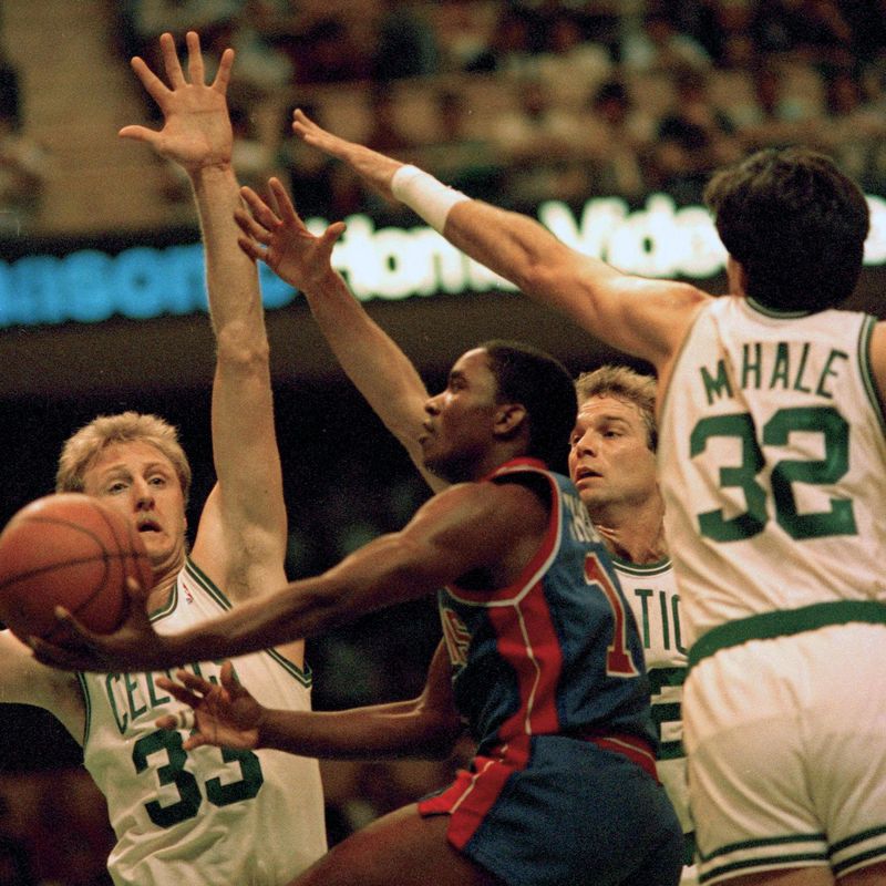 Isiah Thomas gets stopped by Larry Bird