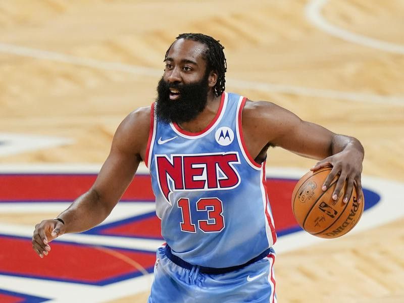 James Harden smiles during game