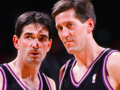 Jeff Hornacek and John Stockton looking out