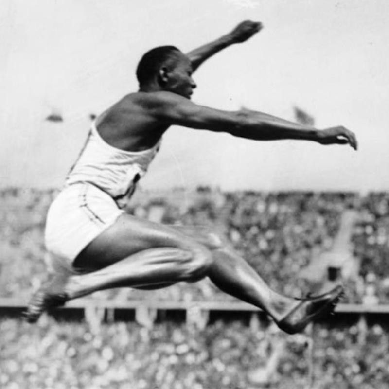 Jesse Owens jumping