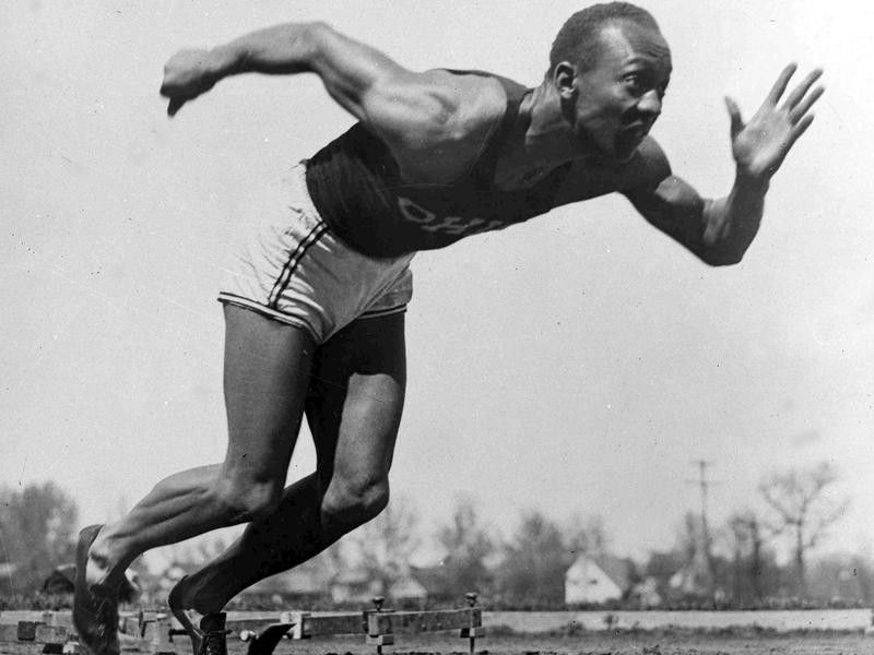 Jesse Owens practices in Olympic Village