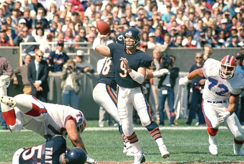 Jim McMahon of the Chicago Bears readies a pass against Buffalo Bills