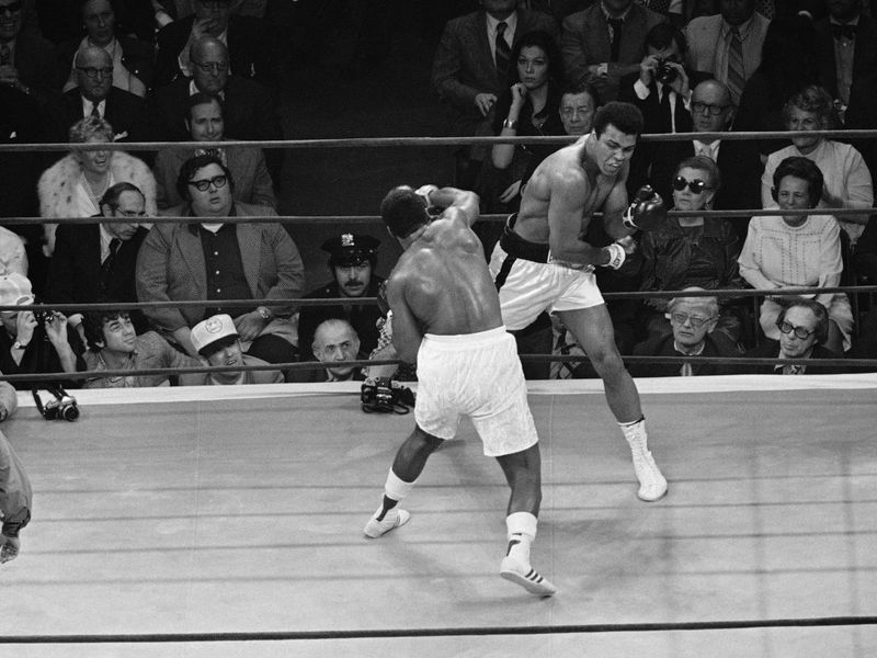 Joe Frazier and Muhammad Ali fight in 1974