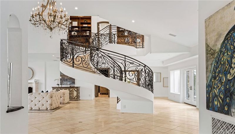 Joe Rogan's House - Spiral staircase in an open floor plan