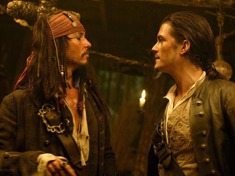Johnny Depp and Orlando Bloom in Pirates of the Caribbean: Dead Man's Chest (2006)