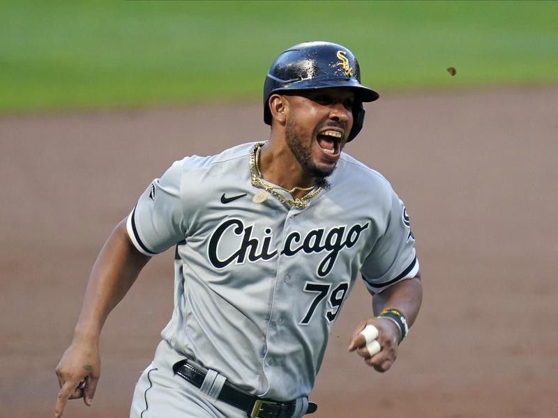 Jose Abreu reacts as he rounds the bases in the first inning