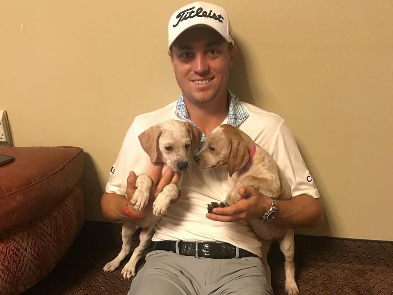 Justin Thomas and puppies