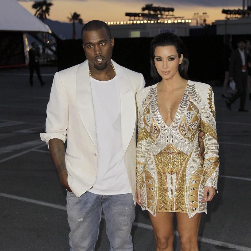 Kanye West and Kim Kardashian arrive