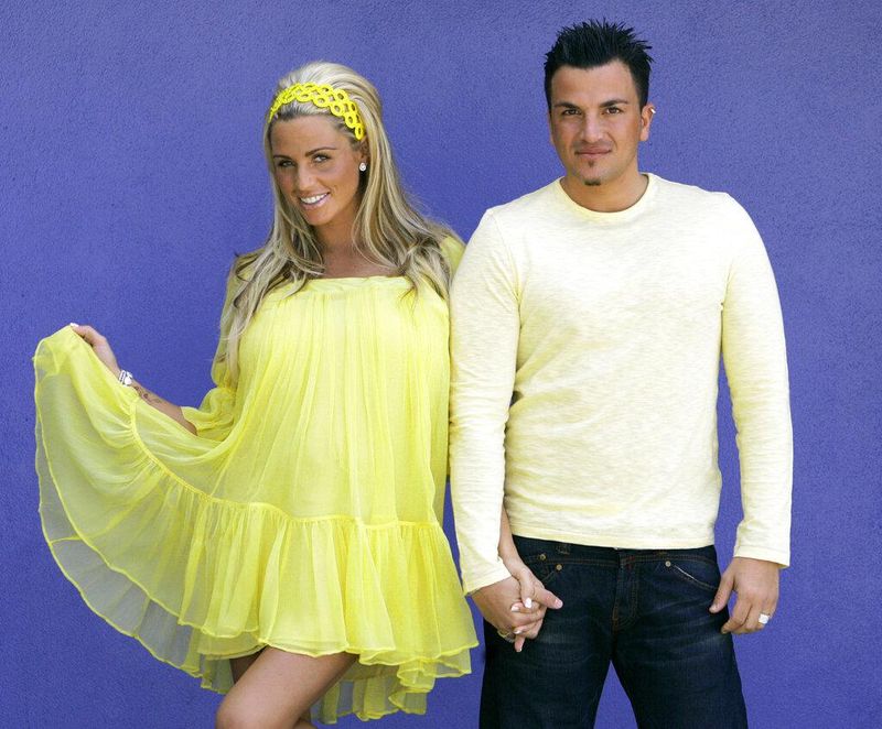 Katie Price and Peter Andre holding hands