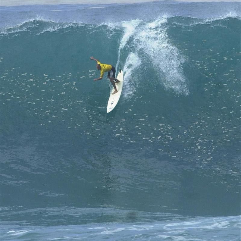 Kelly Slater surfing big waves