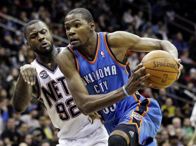 Kevin Durant drives to basket against New Jersey Nets