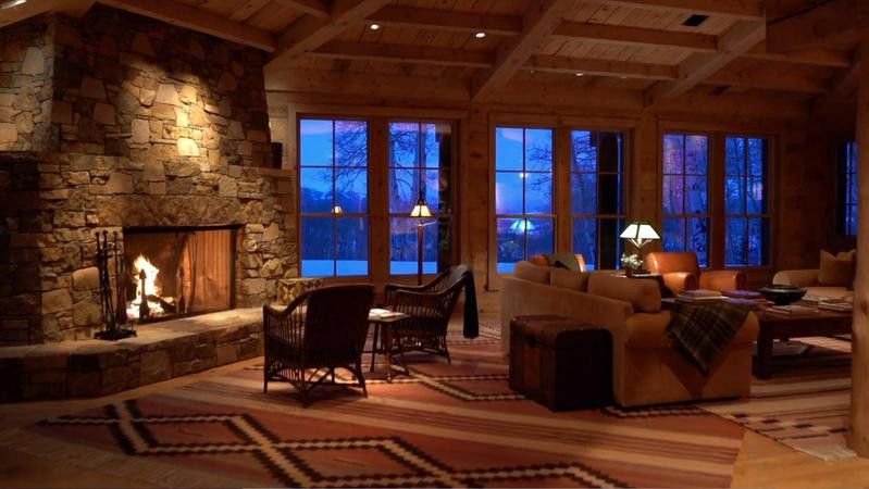 Large stone fireplace in wood ranch home