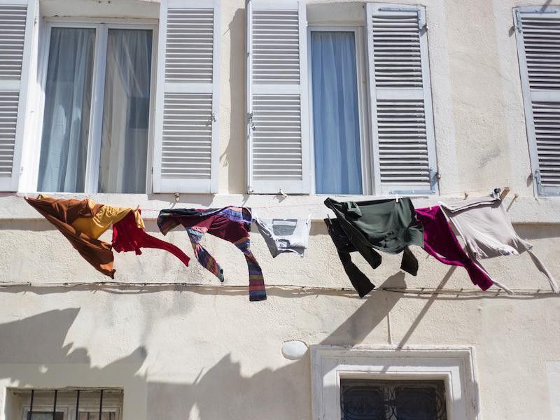 Laundry hanging by window