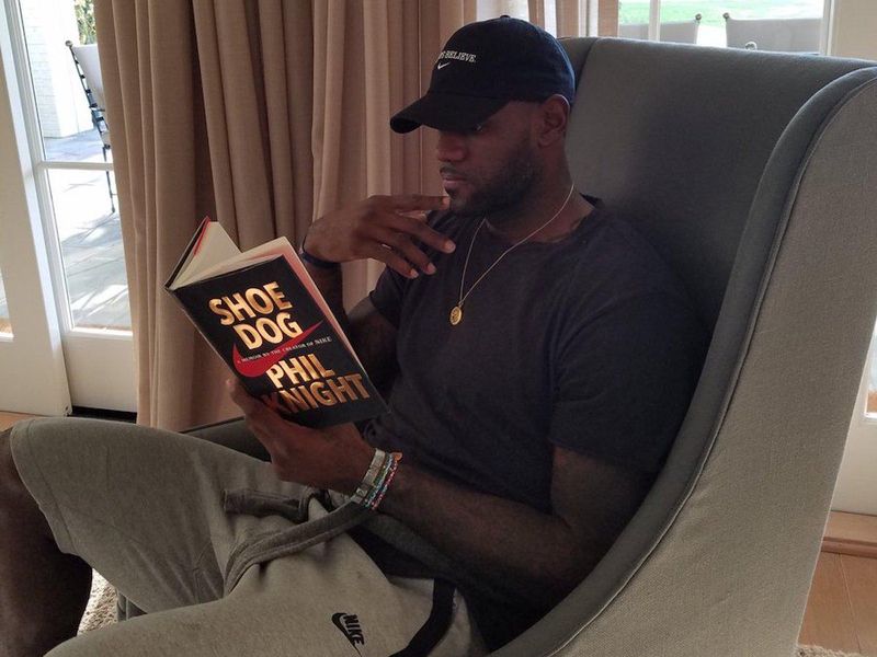 LeBron James reading Phil Knight's book
