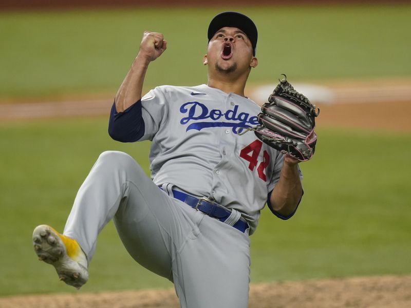 Los Angeles Dodgers starting pitcher Brusdar Graterol celebrates