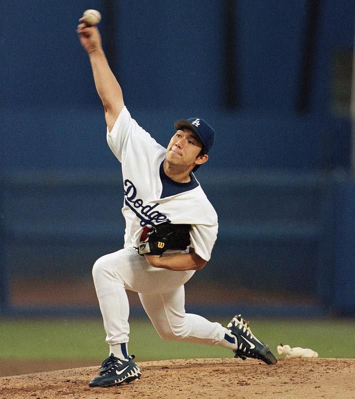 Los Angeles Dodgers starting pitcher Hideo Nomo delivers to home plate