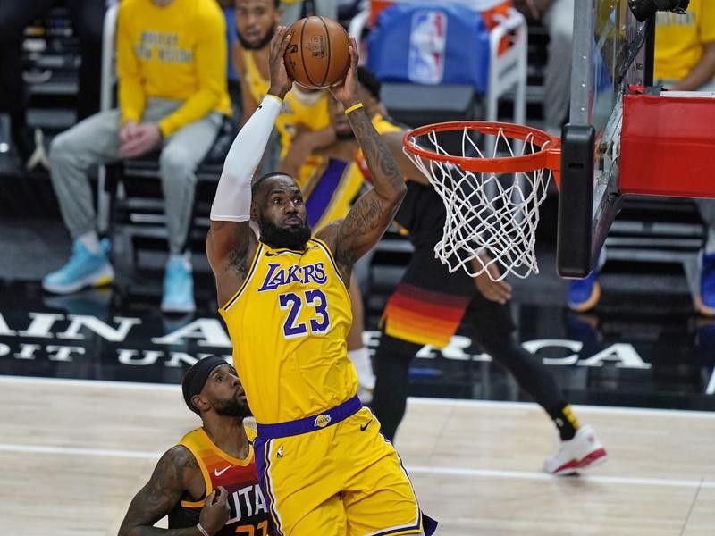 Los Angeles Lakers forward LeBron James goes to basket