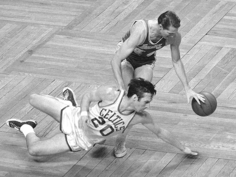 Los Angeles Lakers' Jerry West picks up loose ball