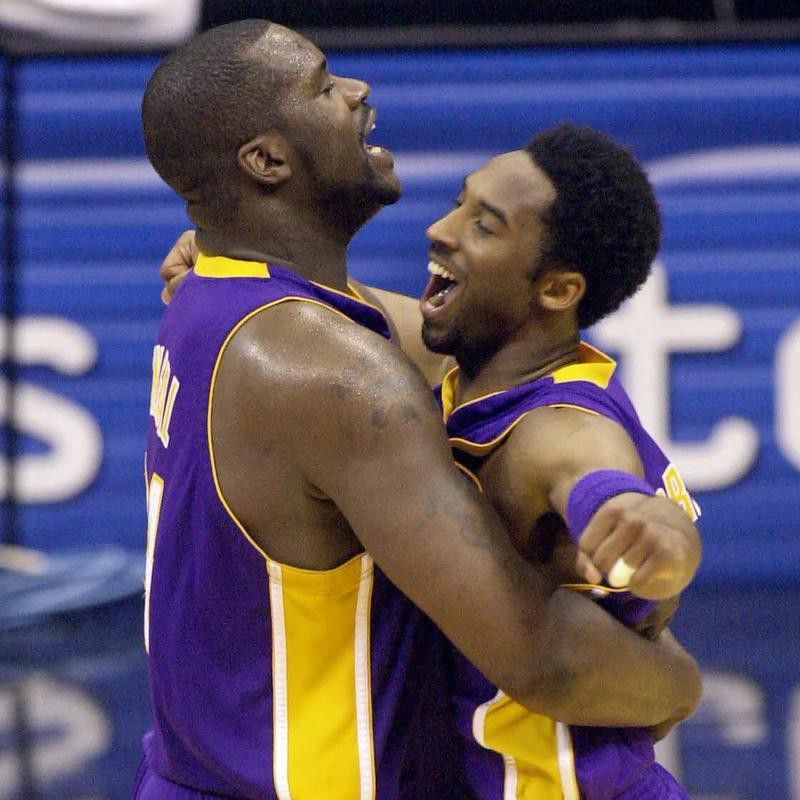Los Angeles Lakers' Shaquille O'Neal and Kobe Bryant embracing