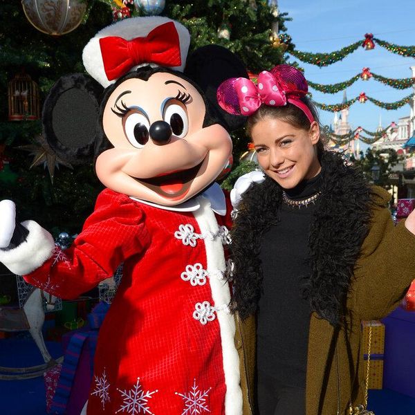 Louise Thompson joins Minnie Mouse to celebrate the Enchanted Christmas at Disneyland Paris, France, on Saturday Nov. 9, 2013. (Photo by Jon Furniss/Invision for Disneyland Paris/AP)