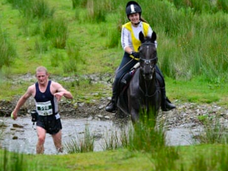 Man and horse in a marathon