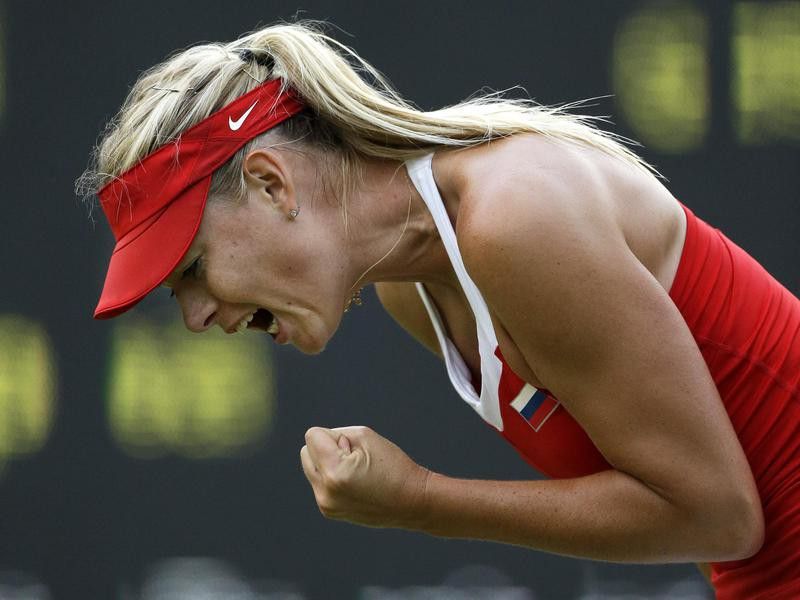 Maria Sharapova yells after winning game