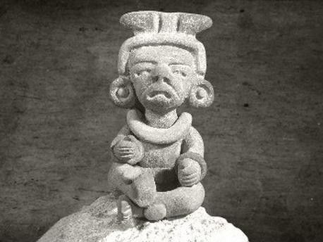 Mayan alux sculpture