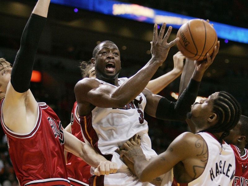 Miami Heat guard Dwyane Wade shoots