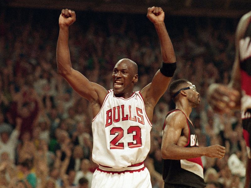 Michael Jordan celebrates Bulls win over Portland Trail Blazers