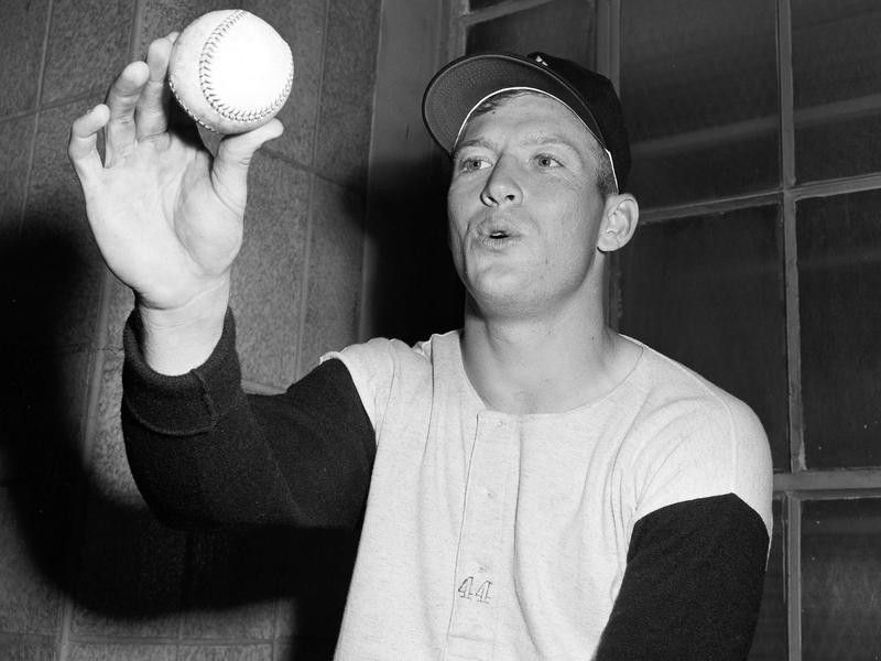 Mickey Mantle holding a baseball