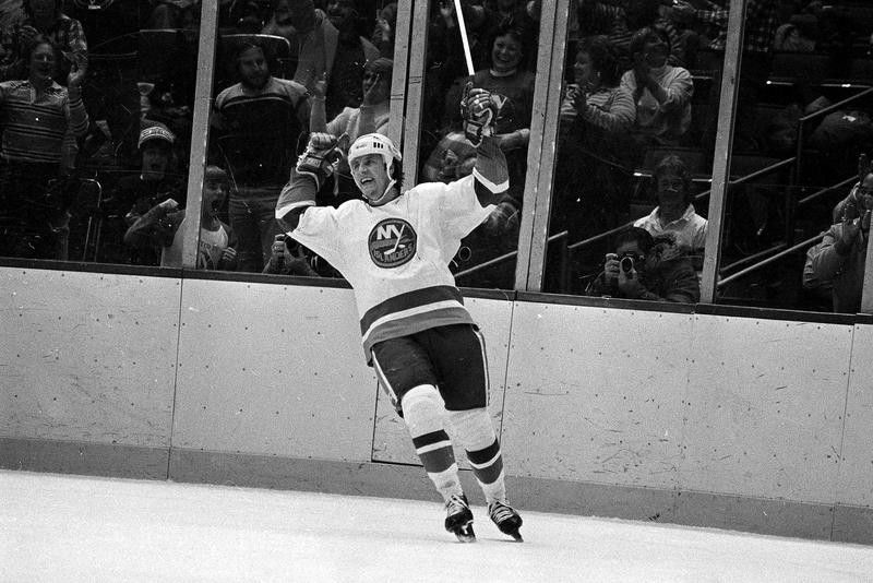 Mike Bossy cheers after his hat trick