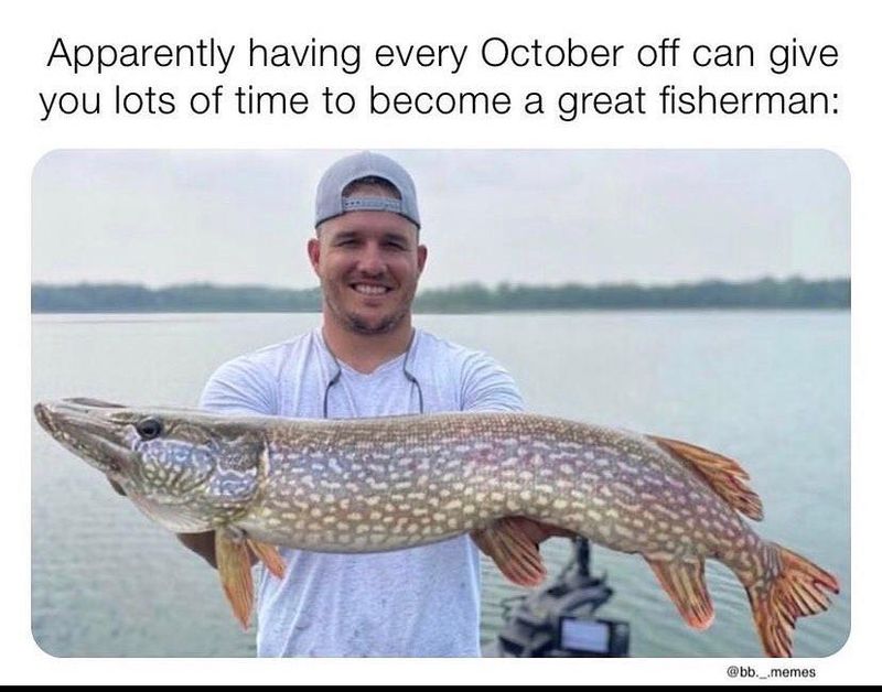 Mike Trout holding a fish